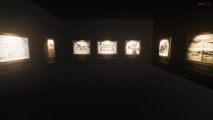 Wide view of the empty museum hall: lit gold frames along three dark walls, each with a plaque and an attribution line below it: the three Panhard et Levassor frames on the far wall, an engineering drawing of the Panhard & Levassor motor car works from The Engineer on the left, and an 1895 photograph of the first petrol car introduced into England beside a 1903 Motorboat Vingt et Un panel on the right, all over a bare dark floor.